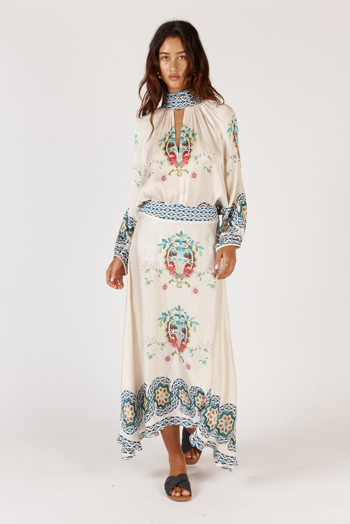 RubyYaya Garcia Shirt Cream styled tucked in at the front, highlighting versatile wear with exclusive print