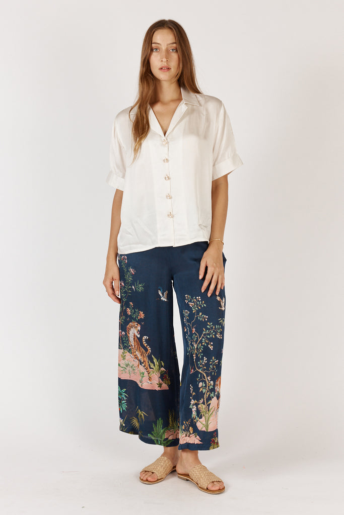 Front view of Rubyyaya Georgia Shirt Cream button-through design in luxe viscose satin, designed in Australia
