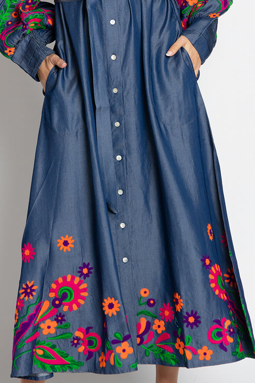 Close-up of the Aari embroidery detail on the bottom of the Rubyyaya Gokarna Maxi Dress, highlighting the fine stitching, button-through front, and soft cotton texture.