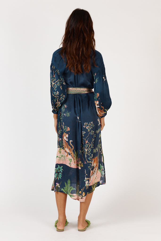 Back view of Rubyyaya Machali Maxi Dress on model, showing self-tie belt detail and relaxed flowing silhouette.