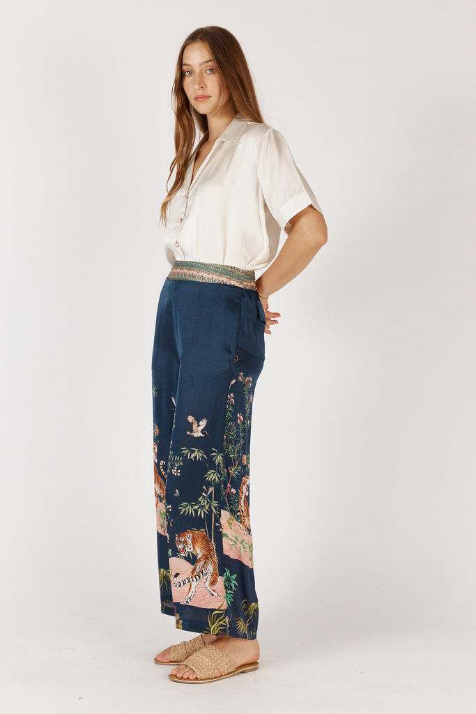 Ruby Yaya Machali Pant side view displaying flowy wide-leg silhouette with side pockets in viscose satin