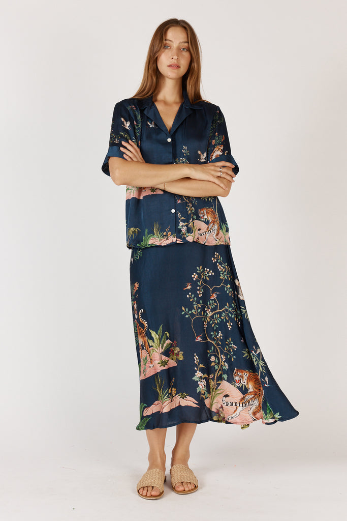 Model wearing RubyYaya Machali Skirt Navy, styled with the matching shirt, showcasing flattering A-line fit and midi length.
