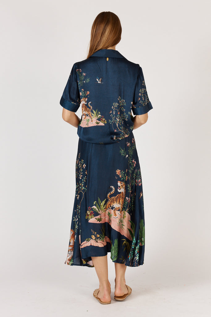 Back view of RubyYaya Machali Skirt Navy featuring elasticated waistband and flowing viscose satin fabric.
