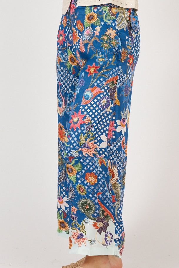 Close-up of Rubyyaya Toscana Pant fabric in viscose satin, highlighting soft drape, stitching details, and wide-leg finish